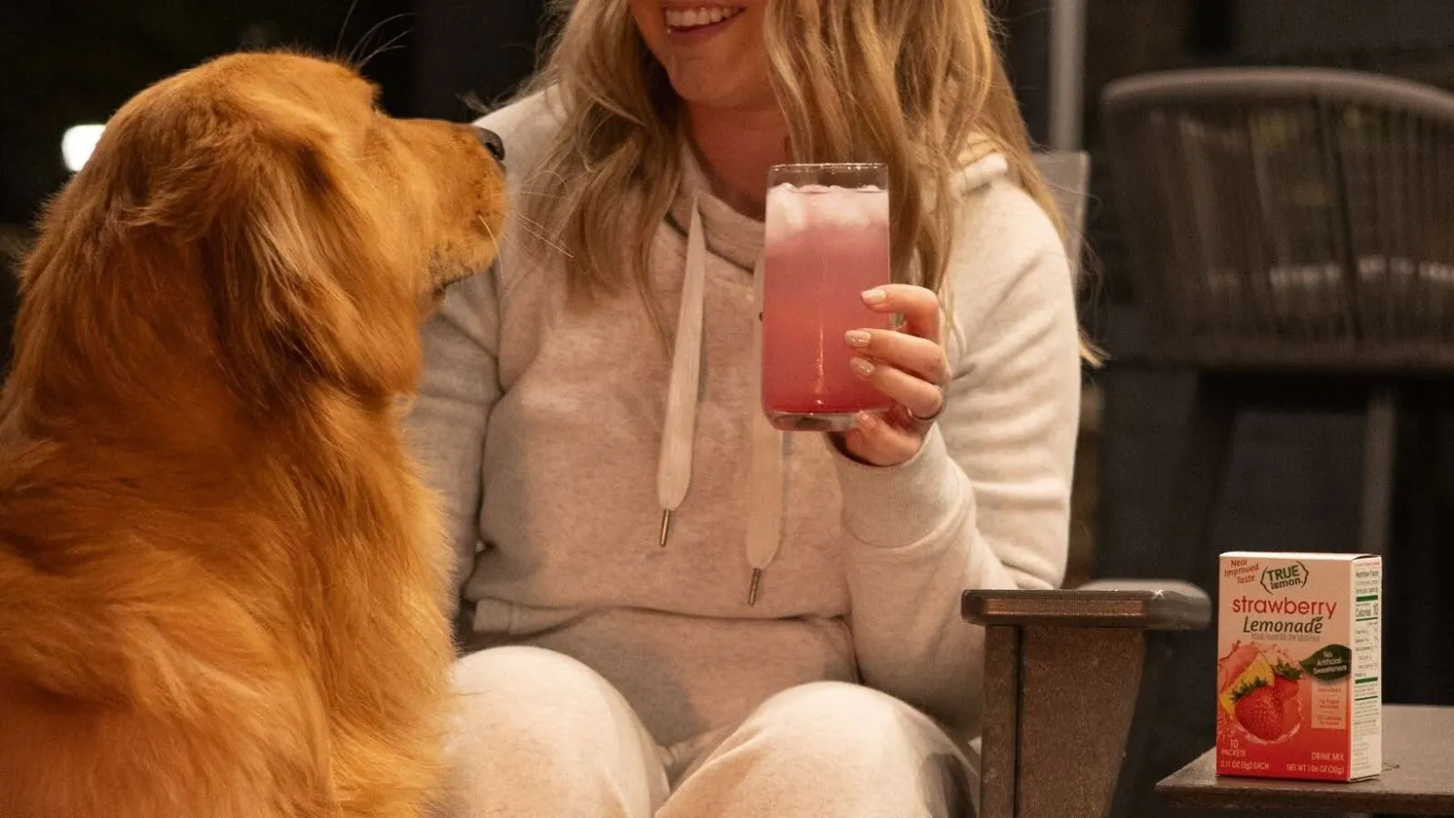 Woman With Dog Drinking True Lemon Strawberry Lemonade