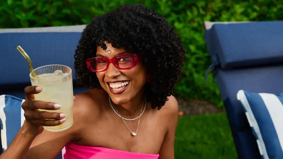 Woman Drinking Lemonade
