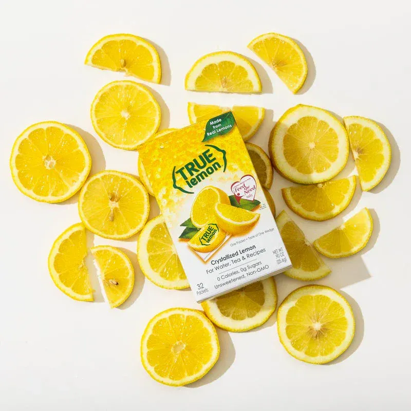 A box of True Lemon on top of sliced lemons.