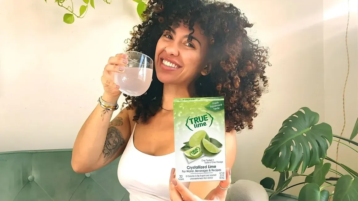 Women Drinking Lime Water Mixes