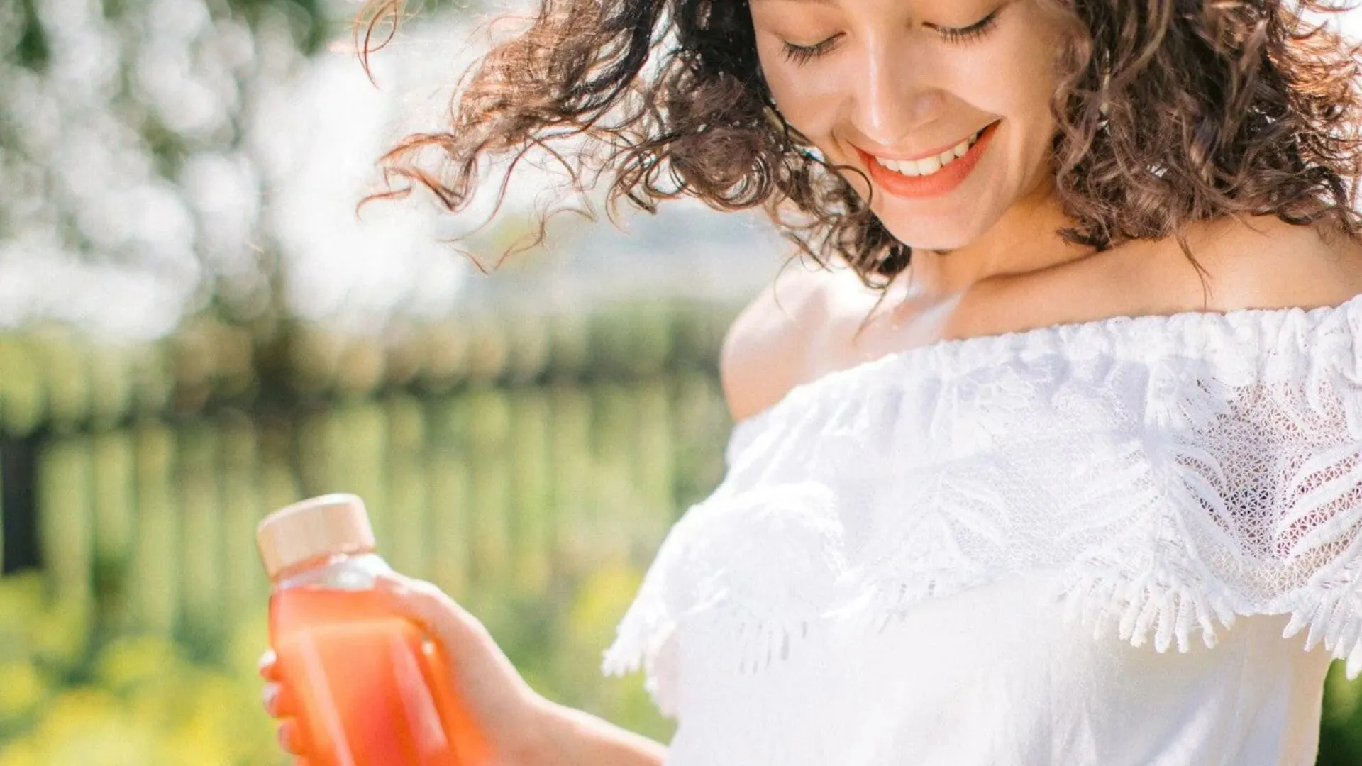 Woman Holding A Flavored Drink During A Fasting Routine