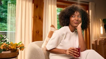  Woman Smiling And Drinking True Lemon Wildberry Lemonade