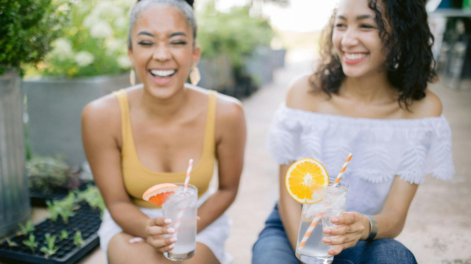 women smiling drinking True Lemon wedge replacement